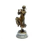 After Dominique Alonzo, a bronze figure of a flautist, modelled in Classical dress,