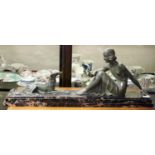 Armand Godard, an Art Deco bronze figure of a woman and a dog, verdigris patina,