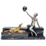 After Zoltan Kovats, a bronze figure of a woman holding a ball, next to a reclining dog,