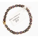 A 9 ct bracelet with coated rainbow topaz