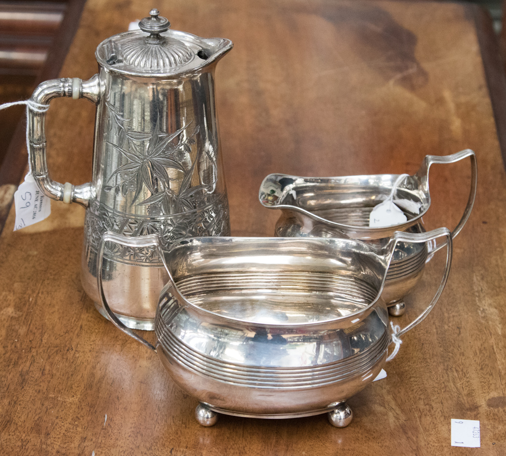 A George III silver boat shaped sucrier and jug,