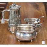 A George III silver boat shaped sucrier and jug,