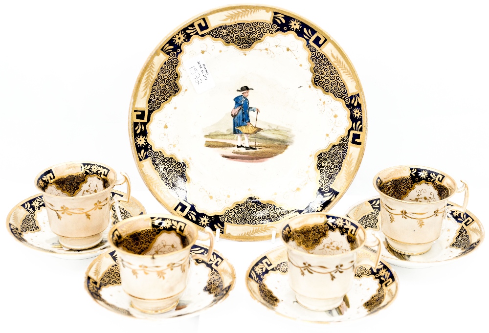 An early 19th Century part tea set, comprising four cups, four saucers and a matching dessert plate,