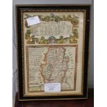 A framed and glazed double sided hand tinted map of Nottinghamshire