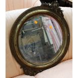 A 19th Century gilt framed oval wall mirror