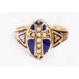 A Victorian seed pearl and blue enamelled 15 ct gold ring with cross design to oval head
