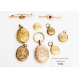 Six gilt metal lockets and two brooches