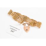 A 9 ct rose gold five-bar gate bracelet with padlock clasp, approx. 18.