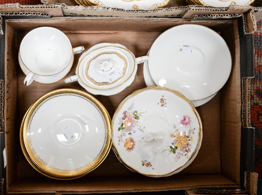 A Royal Crown Derby trio of 'Bali', seconds, four saucers, five tea plates, one sucre, one cup,