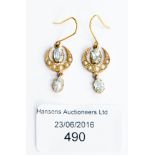 An Edwardian pair of aquamarine and seed pearl drop earrings (wires)