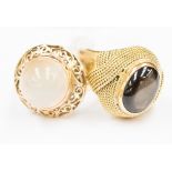 A moonstone set 14 ct gold dress ring together with a 14 ct gold stone set,