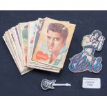 Elvis memorabilia, guitar shaped pin badge 'iron on' figure and approx thirty bubble gum cards (A,B,