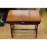 A late 19th or early 20th Century red walnut side table