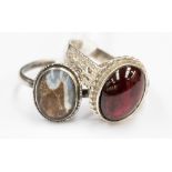 A cherry red tourmaline cabochon ring set in silver, approx.