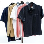 A peach 100% wool polo shirt, long sleeved, a short sleeved black polo shirt by Luke,