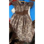 An early dark brown velvet embossed dress by Charlotte Holton,