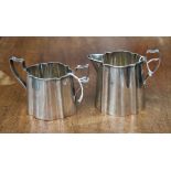 A sterling silver milk jug and sugar bowl,