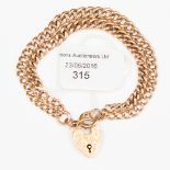 A 9ct gold double chain bracelet with a 15ct gold padlock fastener,