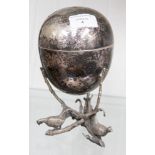 An early 20th Century egg coddler with game bird decoration on branch fitting,