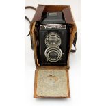 A cased Voightlander camera