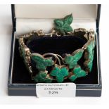 A fine white metal and malachite bracelet in the form of ivy,