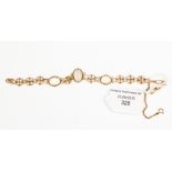 A moonstone and possibly 18 ct gold link bracelet with Albert fastener, safety chain,