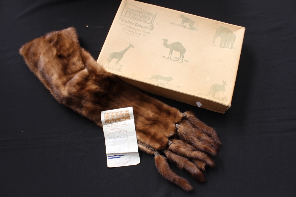 Faulkes mink stole in original box with valuation