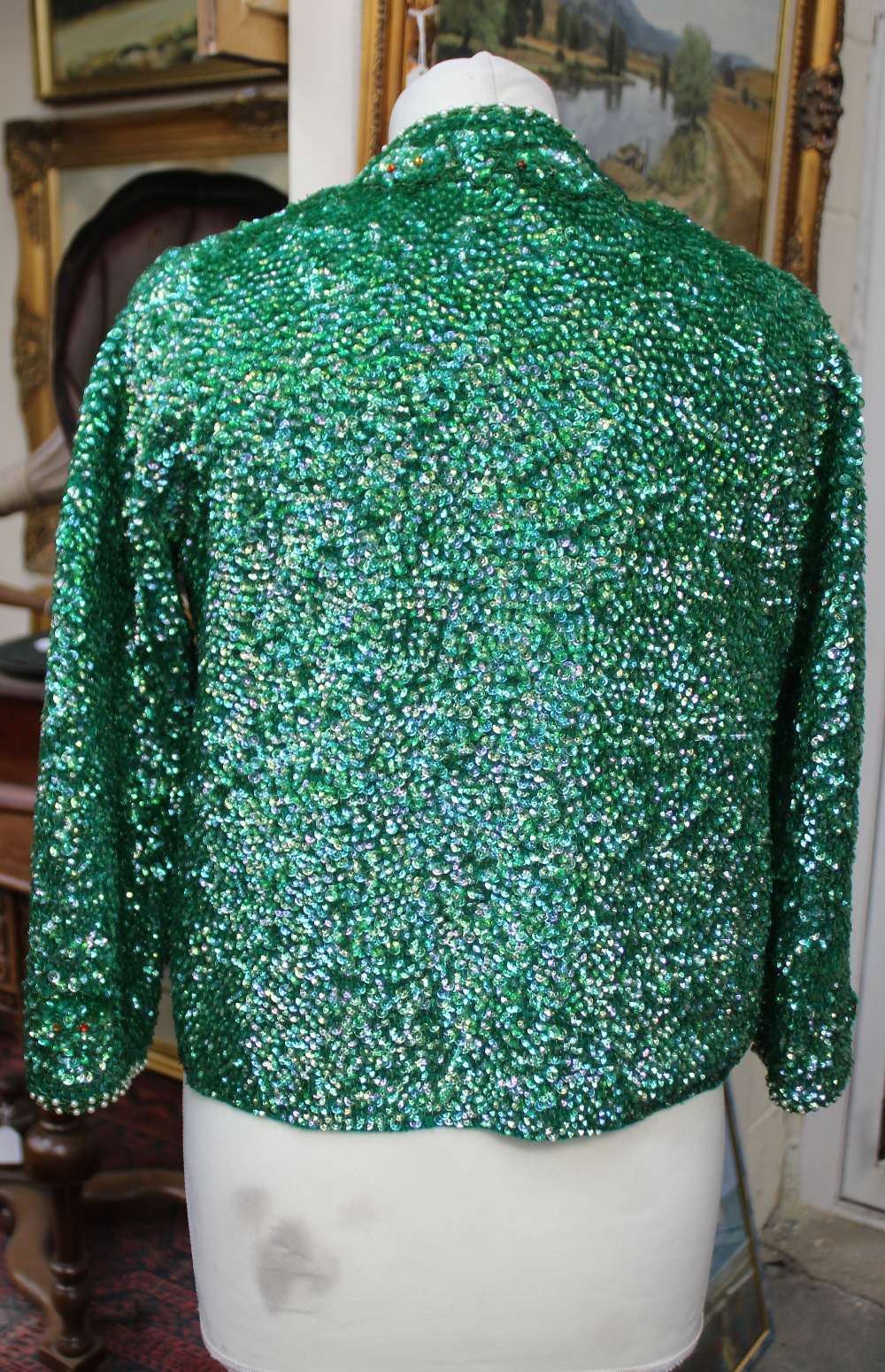 A vintage 1960s ladies' green-sequinned long sleeved evening jacket with seed pearl trim - Image 2 of 2