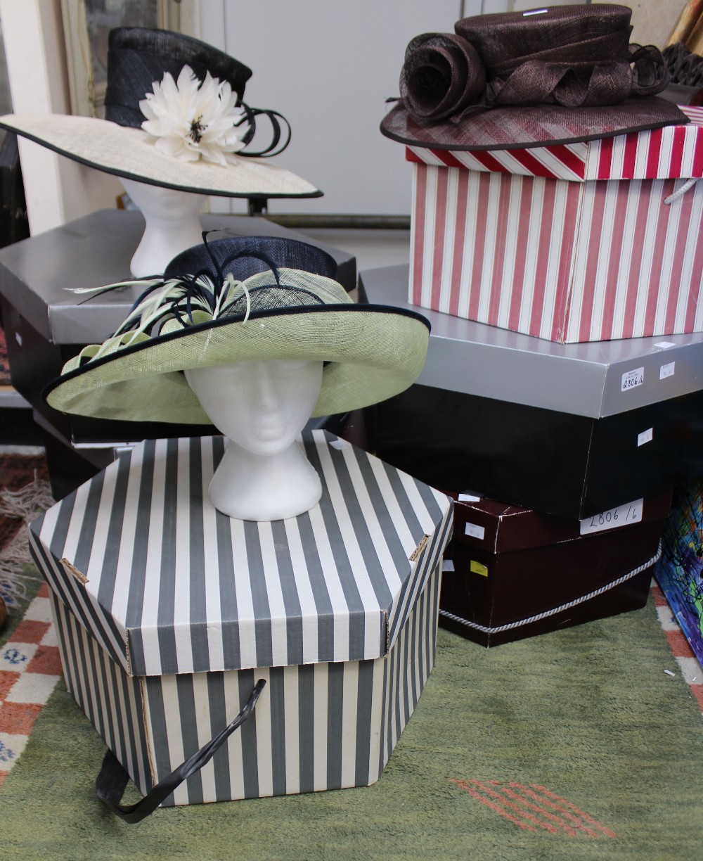 Six ladies' hats for weddings/races, all in hat boxes.