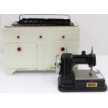 Vulcan Sewing Machine together with a Vulcan Toy Cooker.