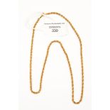 A 14 ct yellow gold chain, 10.8 grms approx.