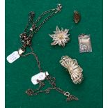 Six items of silver jewellery to include two chains,