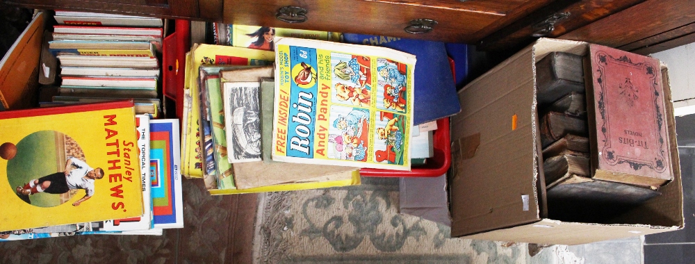 Four boxes of assorted books, comprising of football annuals, children's books, novels,