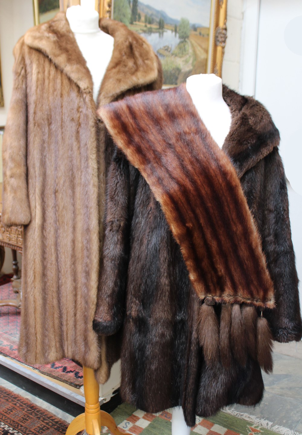 One full length mink coat, single breasted with hook and eye fastening,