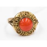 A vintage red coral set 14 ct gold ring, 4.