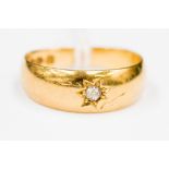 A diamond solitaire 18 ct gold band ring 4.