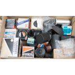 A collection of vintage camera lenses including a Tamron 500mm F8, a Tamron 17mm F3.