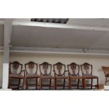 ****TO BE SOLD WITHOUT SEAT CUSHIONS****A set of six Hepplewhite style dining chairs