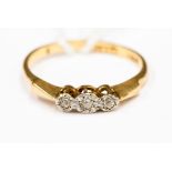 An 18 ct gold ring with illusion set diamond,