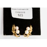 A 14 ct gold pair of cultured pearl earrings