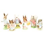 Six Royal Albert and Beswick Beatrix Potter figures, comprising 'Peter Rabbit', 'Mrs Rabbit',