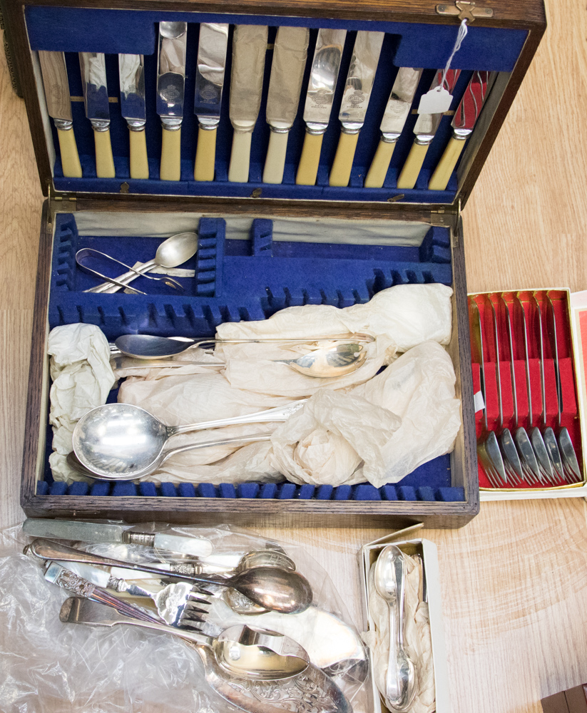 A quantity of silver plated cutlery, to include tea pots,