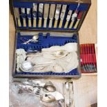 A quantity of silver plated cutlery, to include tea pots,