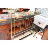 A late Victorian brass bedstead, with back and front ends,