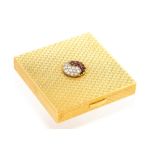 A Cartier 18ct yellow gold square compact set with rubies and diamonds in the Yin and Yang
