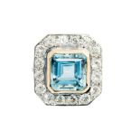 A large aquamarine and diamond octagonal cluster white gold ring,