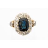A large sapphire and diamond cluster 18ct yellow gold ring,