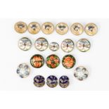 A collection of Art Nouveau buttons, to include six painted and glass in a peacock design,