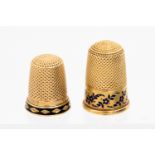 A Victorian gold and blue enamel thimble, the band with floral enamel detail,