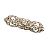 A diamond Art Deco brooch, the centre old cushion cut diamond approx 1ct,